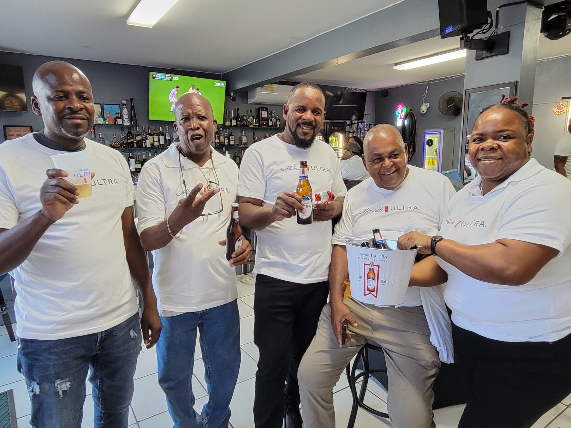 Group cheers at the bar